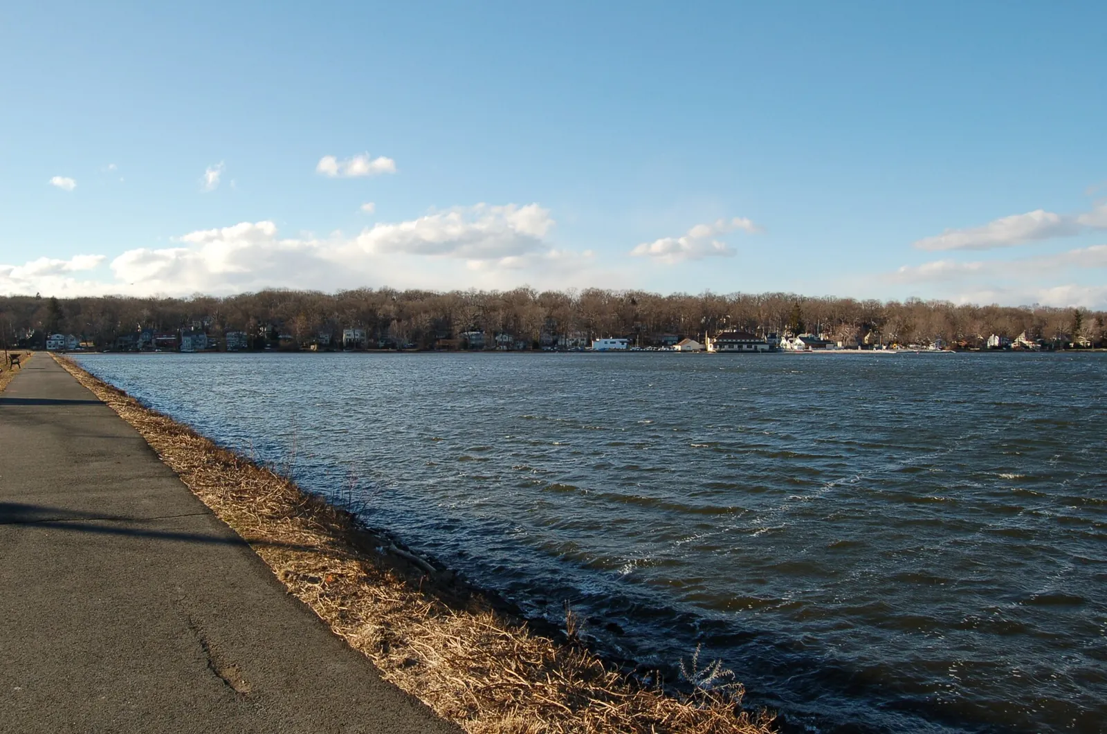 Walkway along Packanack Lake in Wayne, New Jersey, with lakefront houses across the water
